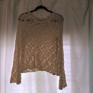 an ivory, knitted sweater